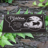 MONTANA STATE PLAQUE with a BOAT and FISHERMAN IMAGE